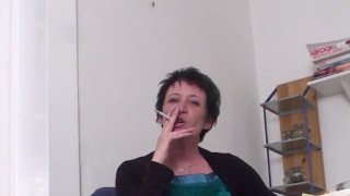 mature lady smoking action