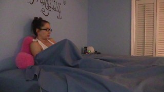 Shy nerdy girl masturbates under the sheets in pajamas