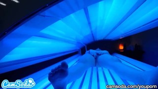 teen latina gets caught rubbing her clit while using a tanning bed
